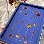Van Cleef & Arpels Magic Alhambra long necklace, 16 motifs Yellow gold, Carnelian, Tiger Eye VCARN5JO00