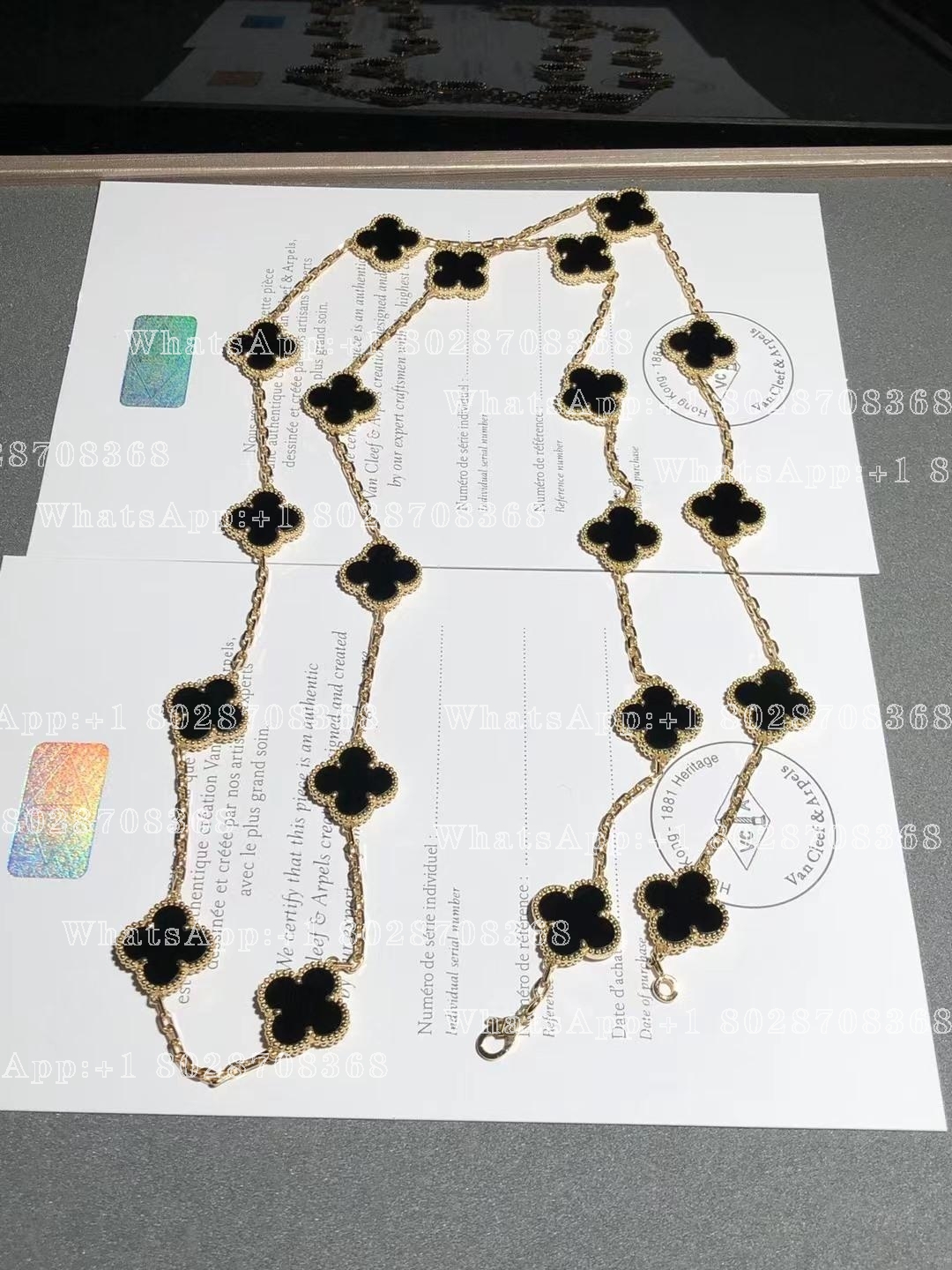 Van Cleef & Arpels Vintage Alhambra long necklace, 20 motifs Yellow gold, Onyx VCARA43100
