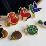 Van Cleef & Arpels Lucky Animals Hedgehog clip Yellow gold, Mother-of-pearl, Onyx, Tiger Eye VCARP2AZ00