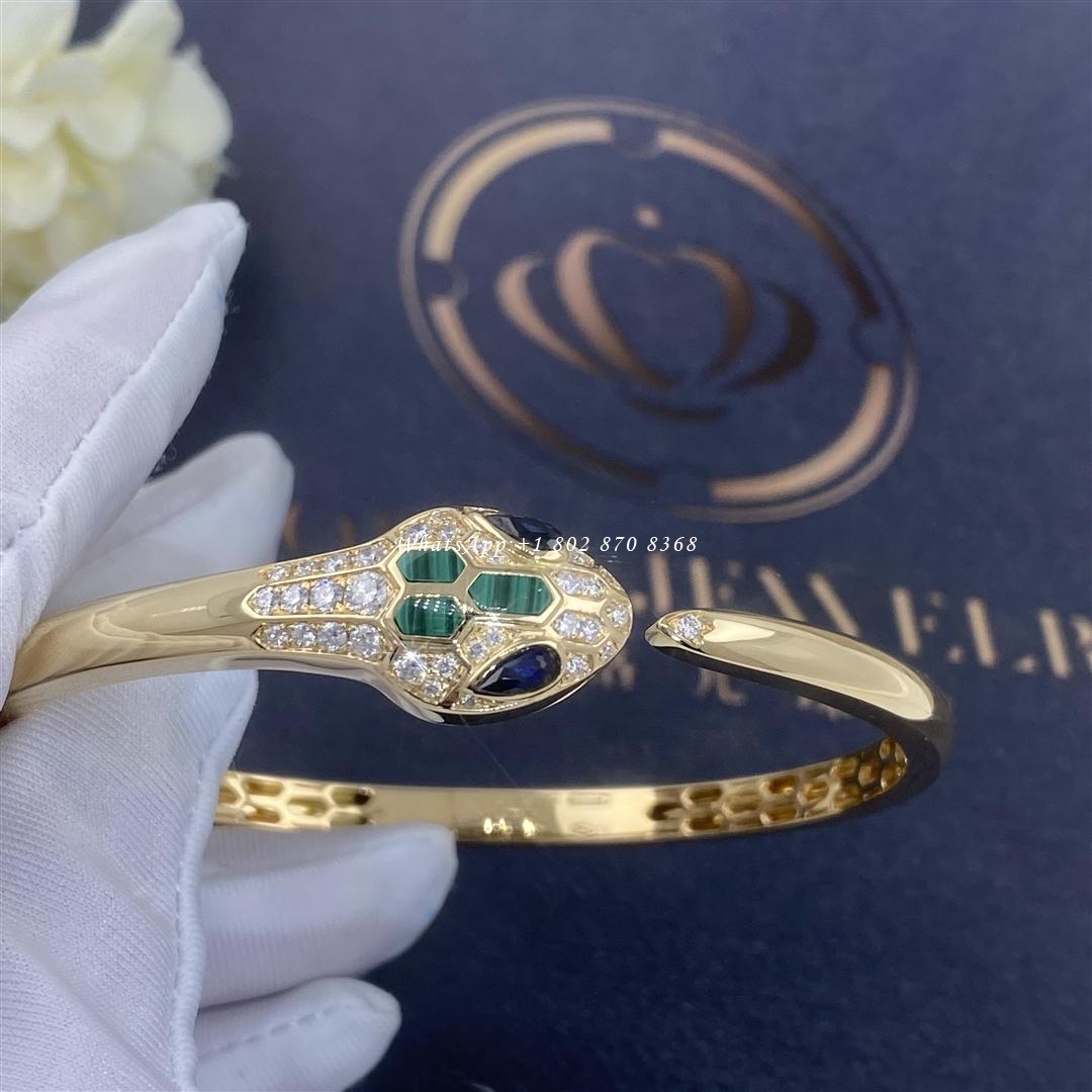 Bulgari Serpenti 18 kt yellow gold bracelet set with blue sapphire eyes, malachite elements and pavé diamonds