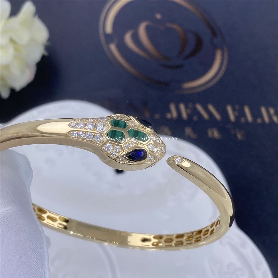 Bulgari Serpenti 18 kt yellow gold bracelet set with blue sapphire eyes, malachite elements and pavé diamonds